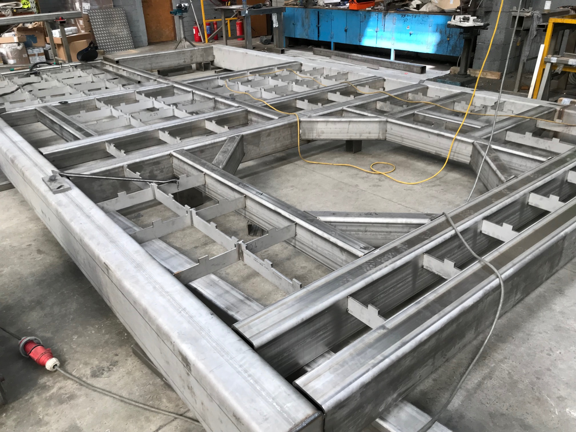Stainless steel structural frames under fabrication in the NoreFab workshop